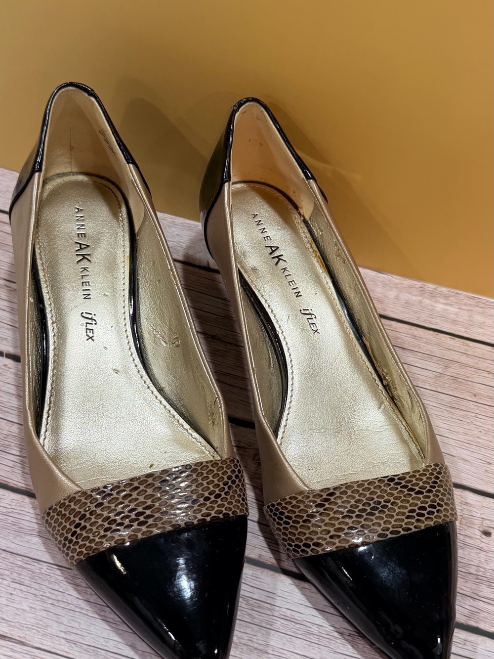 Anne Klein Black and Beige Pointed Toe Pumps with Snake-Print Accent